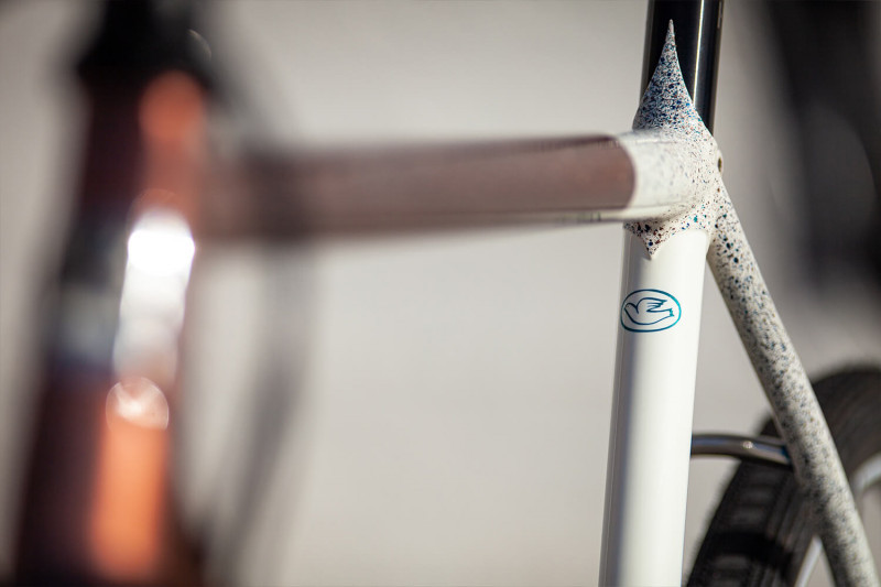 Closeup view of the top tube and seat tube on the Dogwood Cycleworx Copper Gravel frame.