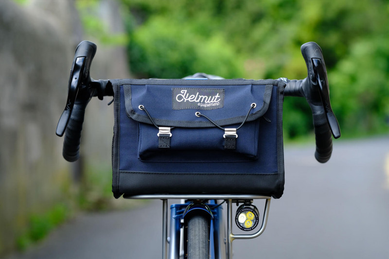 Closeup shot of the Victoire Cycles handlebar bag attached to a drop bar handlebar.