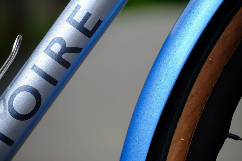 Closeup detail of the frame featuring the down tube with the Victore logo.